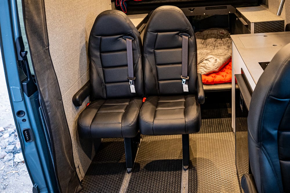 Camper van floor with removable seating
