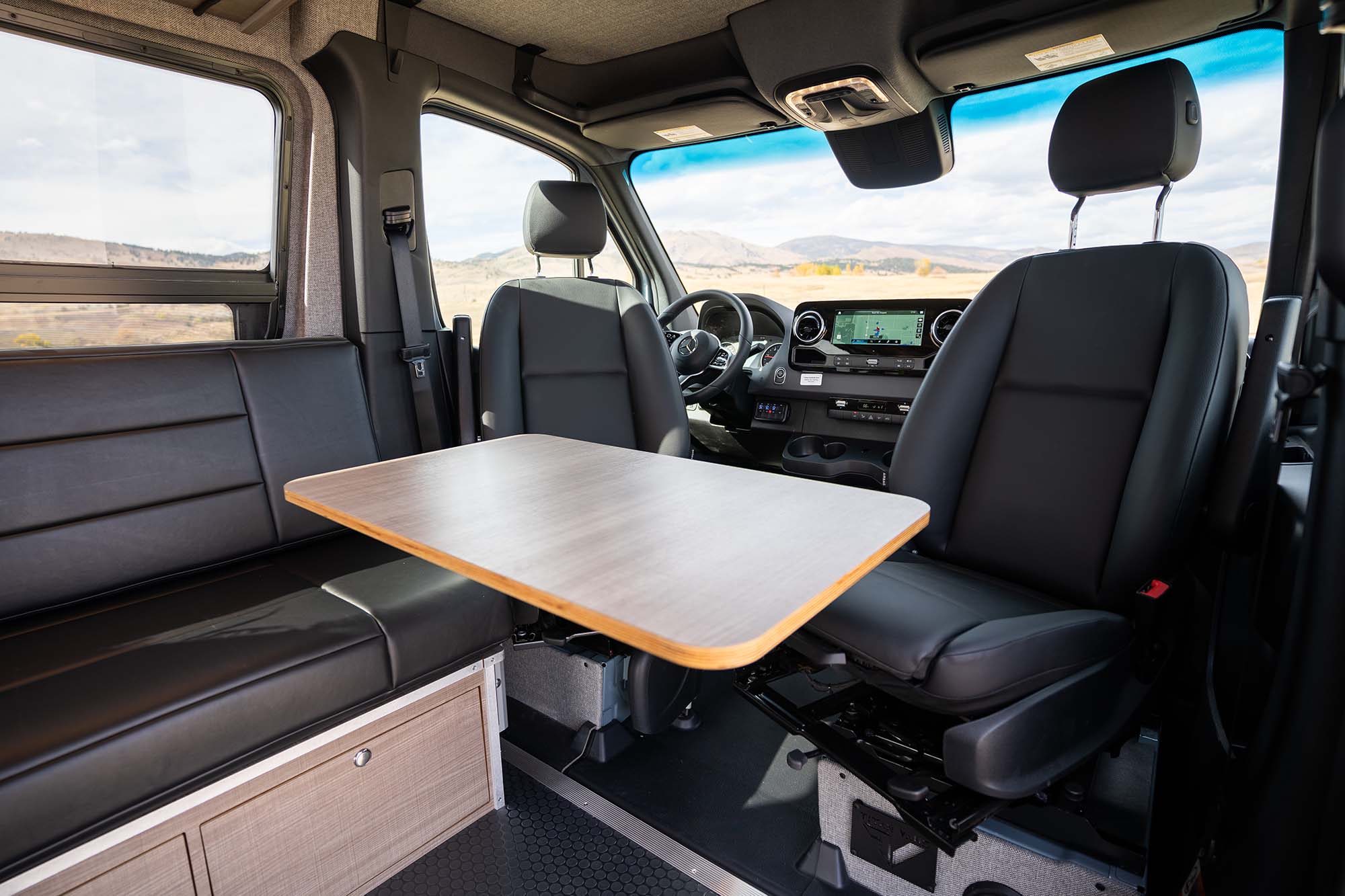 The adjustable Lagun table that's included in the Metis camper van base model