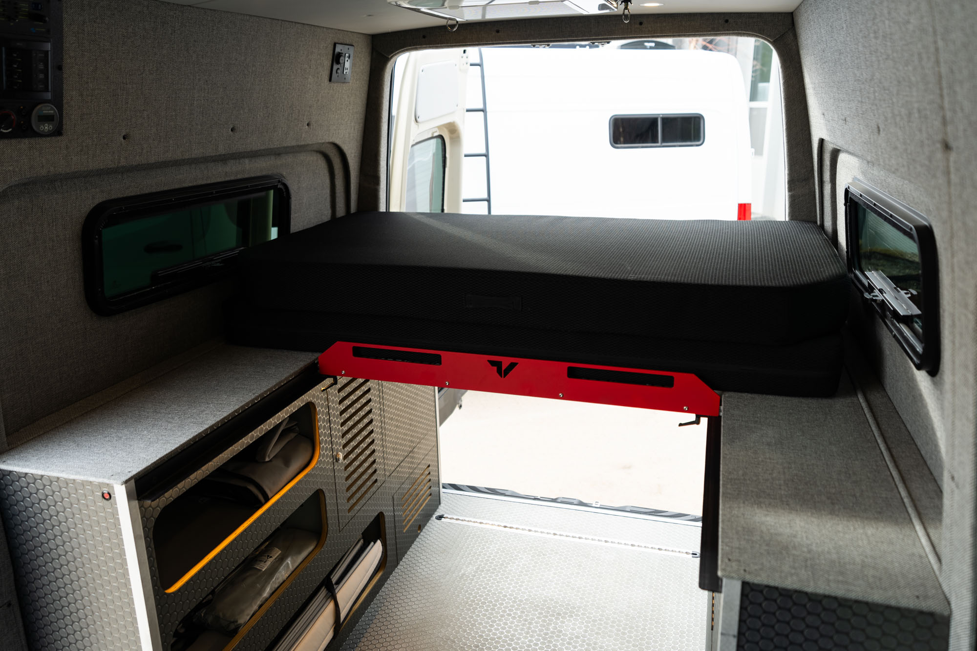 the camper van bi-slide bed and mattress stowed away