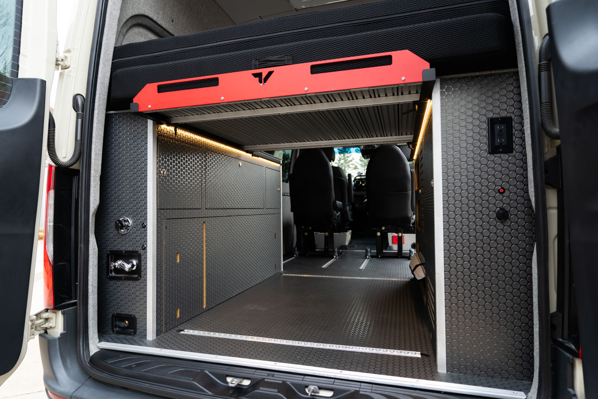 camper van wheel wells from the rear