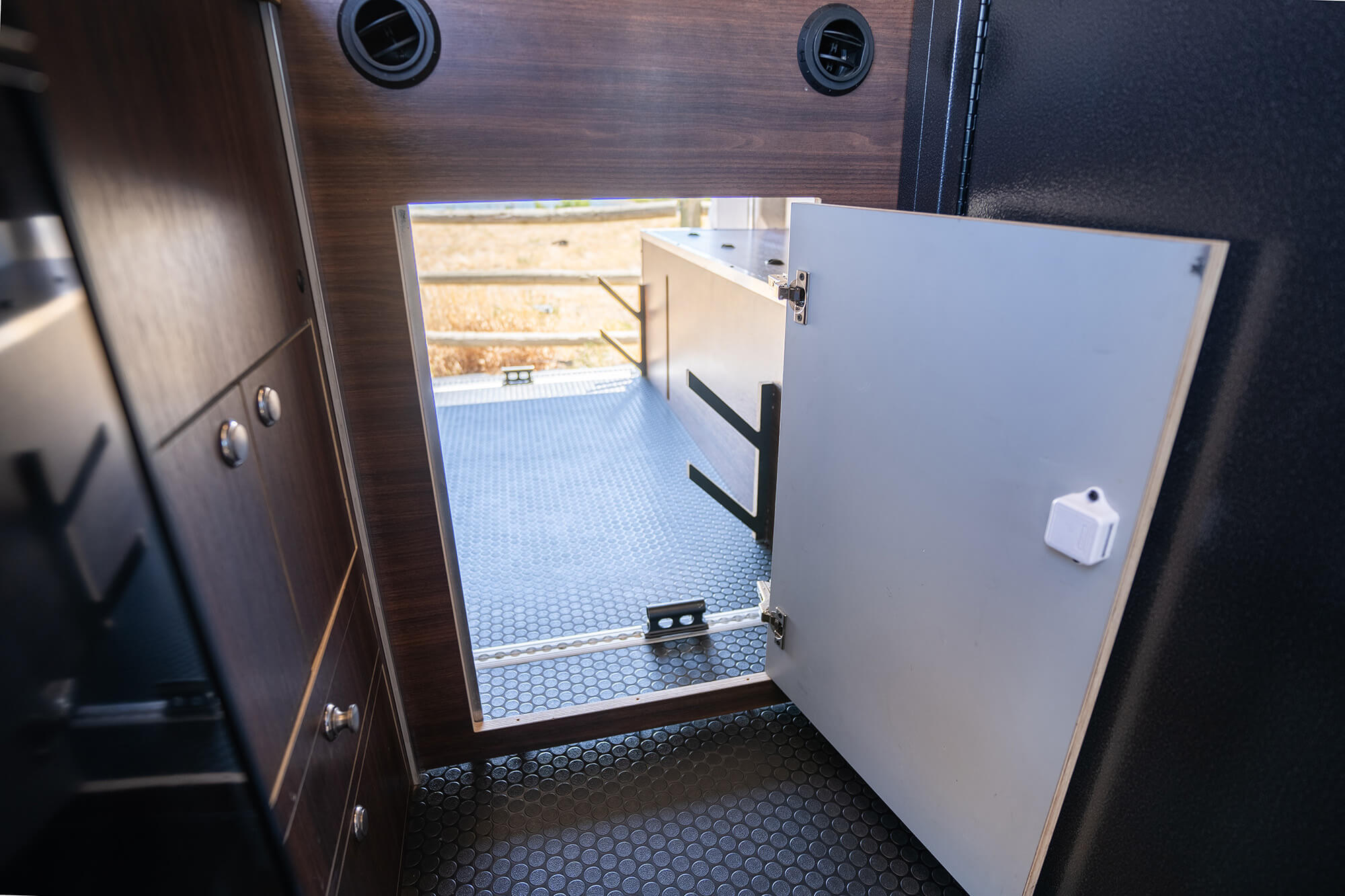 Camper van door from living space to garage