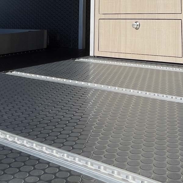 coin dot flooring with l track in camper van