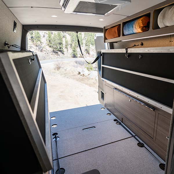 Murphy bed with ceiling-mounted strap