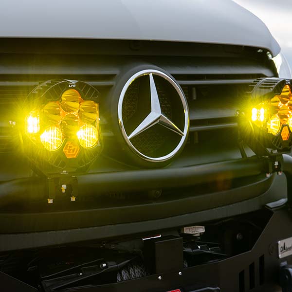 lights attached to front bumper of camper van