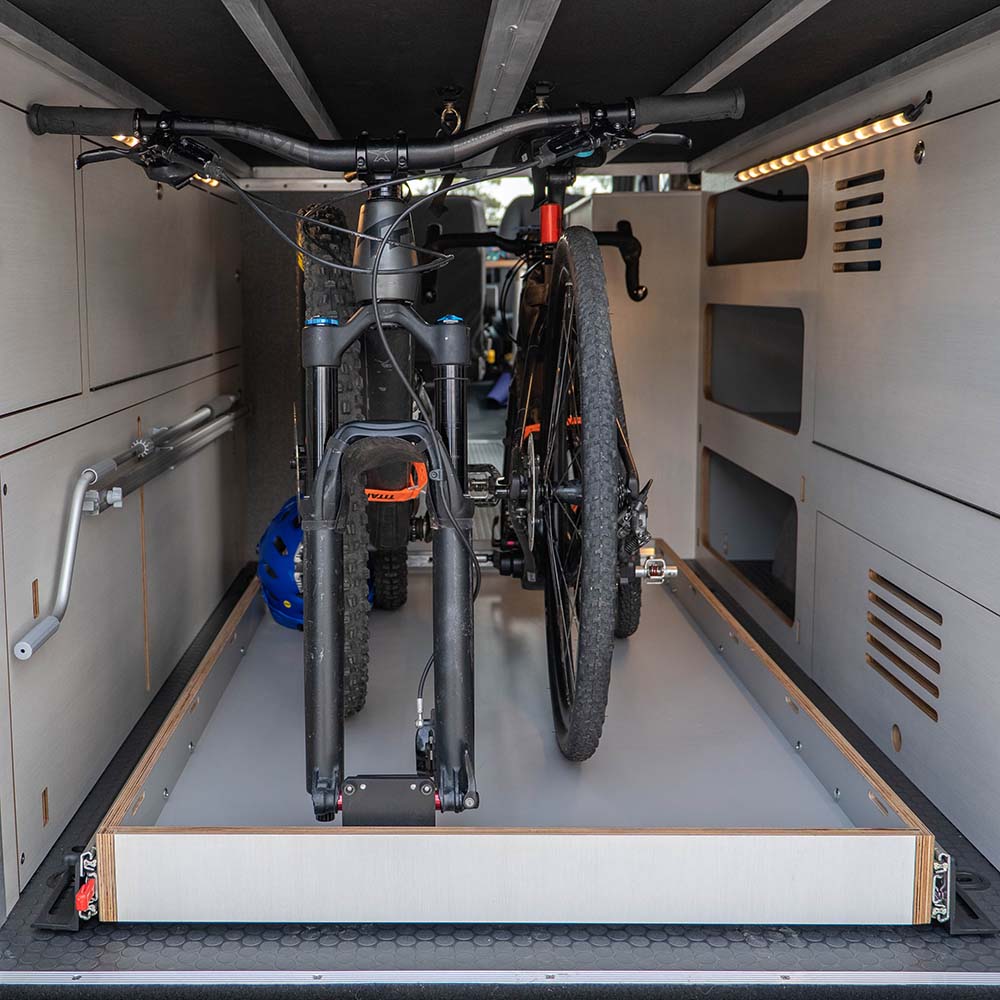 slide-out-tray sticking out the back of a van