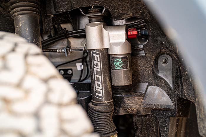 van wheel well with suspension upgrade