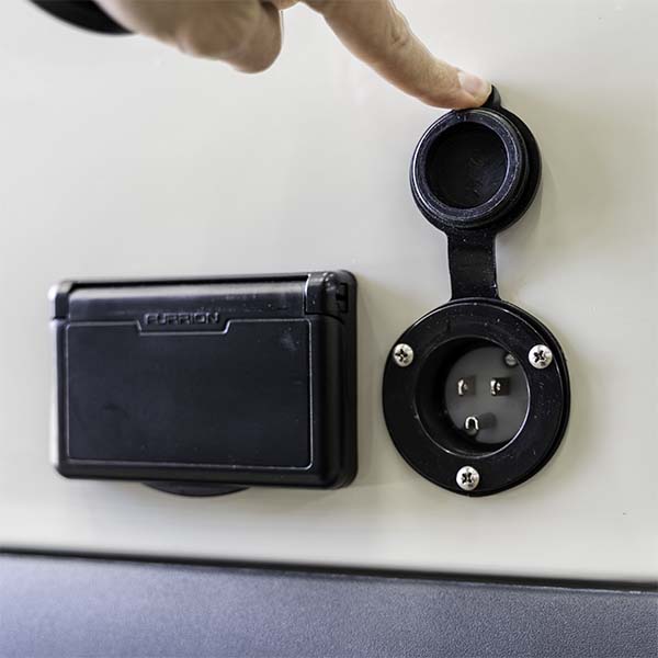 Shore power and outlets for camper vans