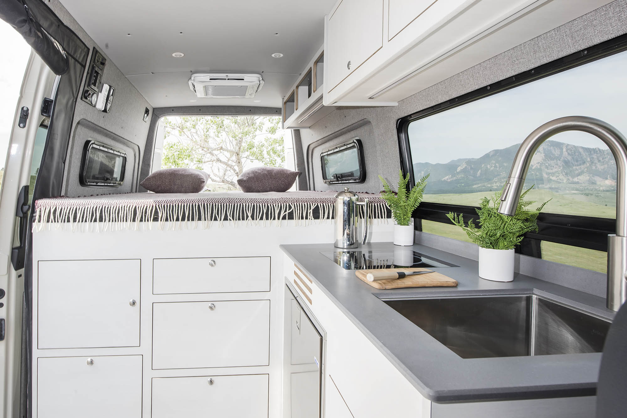 The interior living area of the Kronos camper van