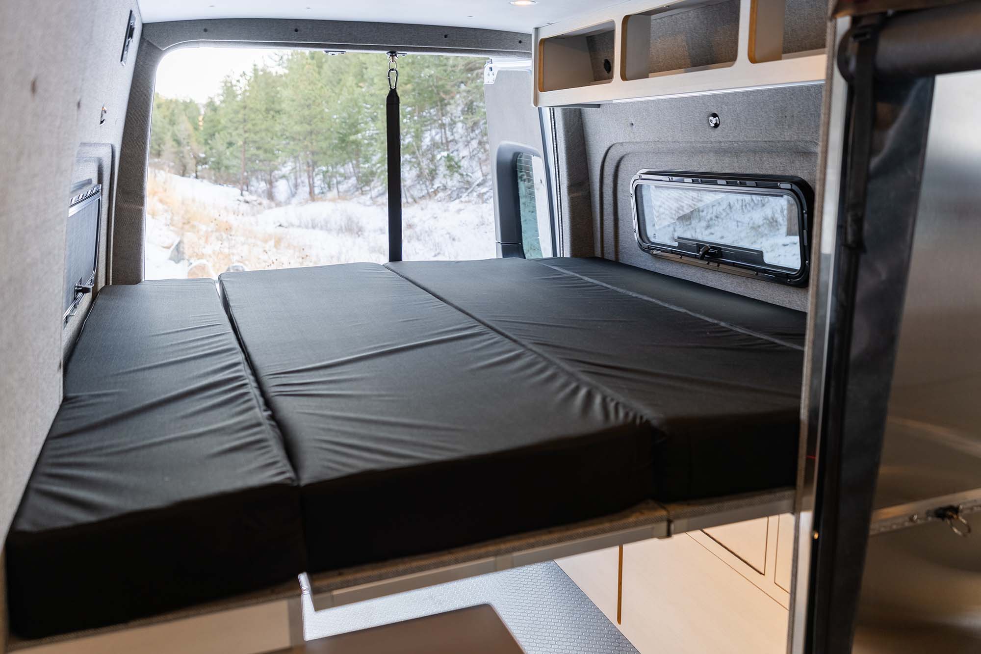 The legless murphy bed set up with the mattress