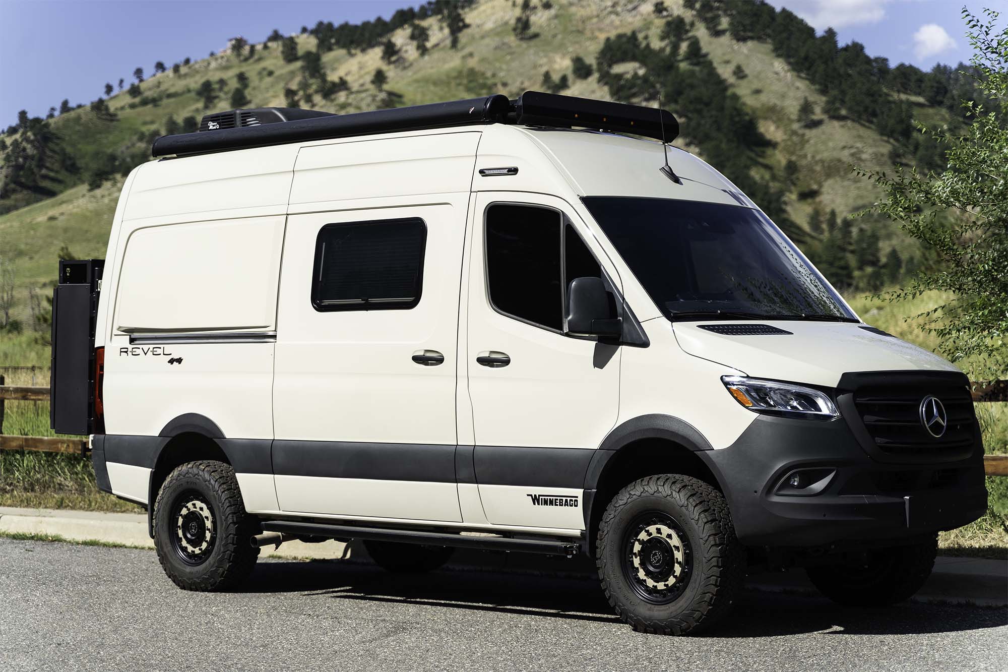 Winnebago Revel camper van with awning